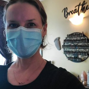 face mask during massage in Denver and Boulder